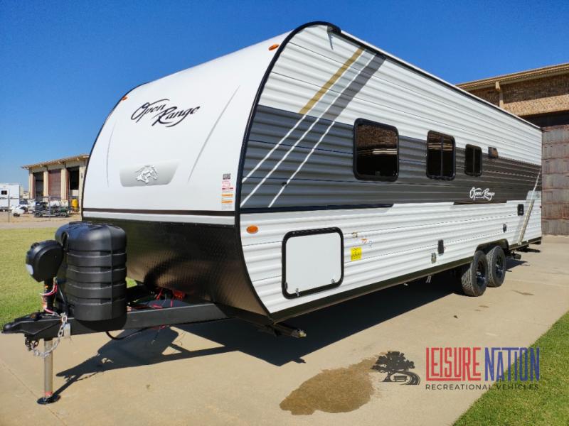 Highland Ridge RV Open Range Conventional 26BH exterior view parked on a concrete pad